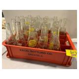 PLASTIC CRATE FULL OF GLASS SODA BOTTLES OF ALL