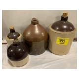 4 UNMARKED CROCK JUGS
