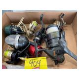 FLAT W/ SKIPPER, SHAKESPEARE & MISC FISHING REELS