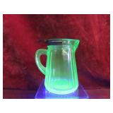Vintage vaseline glass Syrup pitcher.