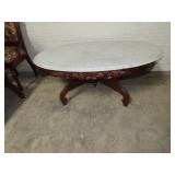Oval marble top antique coffee table.