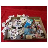 Vintage buttons sewing related items.