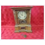 Antique key wind mantle clock.