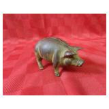 Vintage cast iron pig bank.