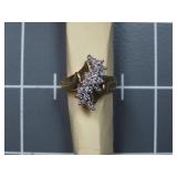 10k yellow gold ring w/stones.