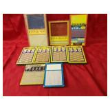 Vintage game gambling punch boards.