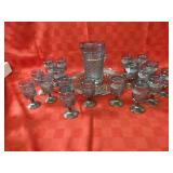 Indiana glass iridescent pitcher & stemware.