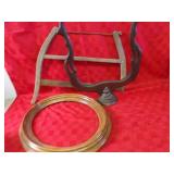 Antique buck saw, round picture frame, frame.