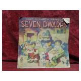 1938 Walt Disney's Seven Dwarfs linen book.