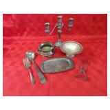 Silver plate serving dishes, candelabra.