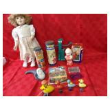Vintage duck pull toys, porcelain doll, gumby.