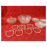 Clear crystal bowls, apple dishes.