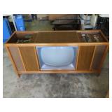 Vintage Magnavox TV stereo turntable console.