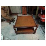 Vintage square coffee table on casters.