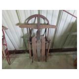 Vintage steel runner snow sled.