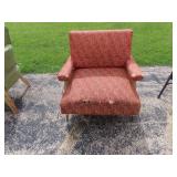 Vintage upholstered mid century armchair.