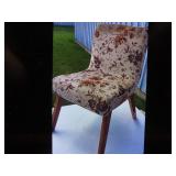 Vintage upholstered floral pattern chair.