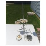 Vintage metal plant stand needs repair.