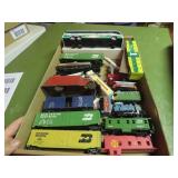 Bus toy, train cars, toy truck.
