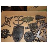 Cast iron & metal trivets lot.