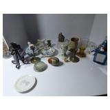 Syrup pitcher, stick pin holder, candle holders.