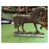 Cast iron horse doorstop.