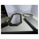 Mirror, vanity tray, alarm clock, metal box.