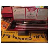 Gun cleaning kits & knife sharpening tools.