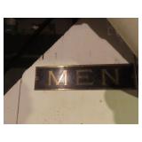 Vintage brass Mens room sign.