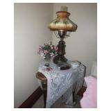 Antique ornate table, table lamp, trinket box.