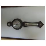 Wall mount thermometer barometer.