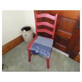 Red painted high back chair w/blanket.