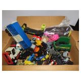 Box of vintage toys.