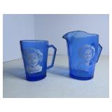 (2)Shirley Temple blue glass pitchers.