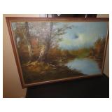 Framed landscape painting.