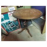 Antique wood side table tilting. needs glue.