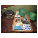 Sharpe calculator, John Deere hats, stapler