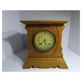 Vintage pressed wood mantle clock. New Haven.