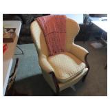 Vintage Upholstered high back armchair.