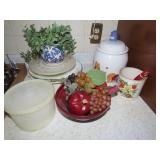 Winnie Pooh cookie jar, plates, tupperware, misc