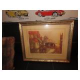 Framed landscape print.