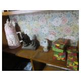 Pottery stein, praying hands, boxes.