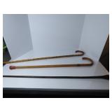 (3)World's fair walking stick canes, stacked leath
