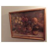 Framed still life floral print.