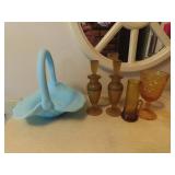Amber glass perfume bottles, satin basket.