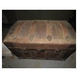 Antique steamer trunk. domed.