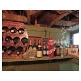 Wine rack, decanter, assorted bottles lot.