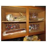 Contents in cabinet. Pepsi glasses, misc.