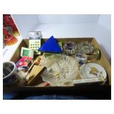 Calculator, mug, games, serving dishes.