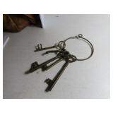 Vintage brass skeleton keys on ring.